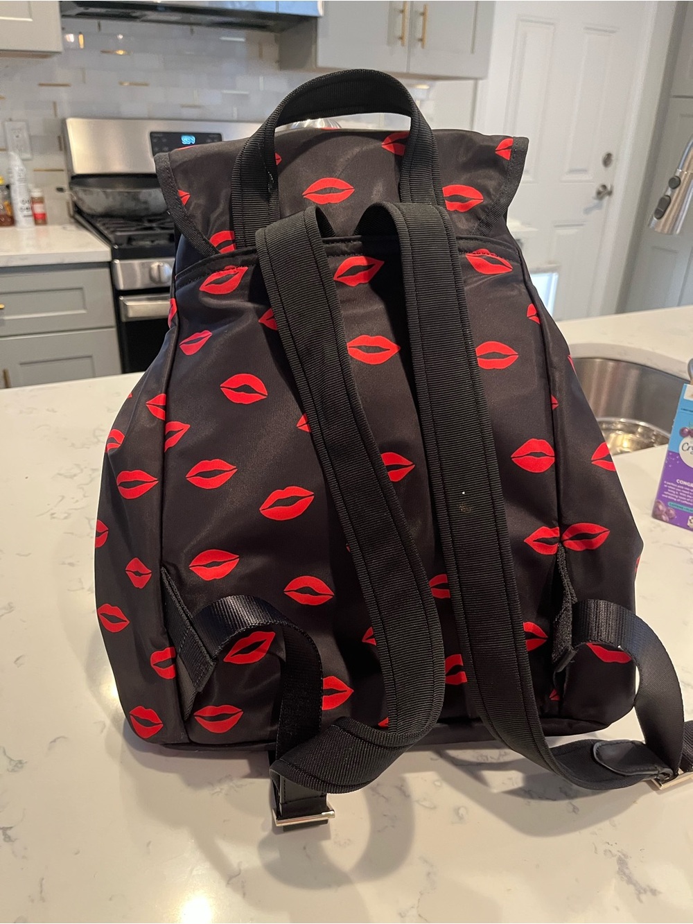 kate spade Black Backpack with Red Lip Print Pattern - Picture 2 of 2
